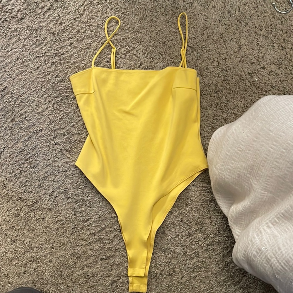 Yellow bodysuit
